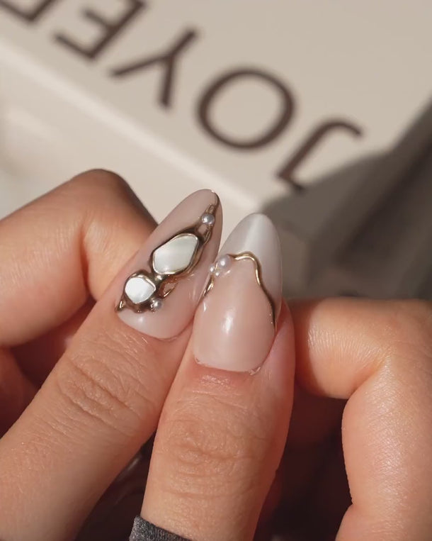 Baroque pearl press on nails with molten gold and real pearls on a nude base