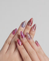Baroque Palette press-on nails video with marble swirls, gold outlines and rose accents