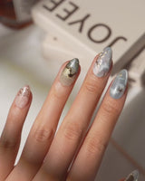 Renaissance Fresco press-on nails video showing painted angels, clouds and gold accents