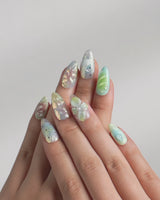 Seaglass Swan video showing iridescent pastel nails with florals and swan motif