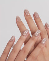 Silver Bead video showing metallic dot texture on glossy champagne nude nails