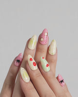 Kiki’s Enchanted Picnic press-on nails — Pastel Multicolor, Hand-painted Cat & Bow. handmade nail art by Joyee Nails