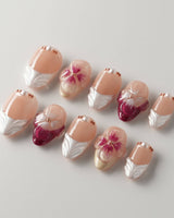 Duchess Purple extra short almond nails with lavender floral sculpture and glossy finish