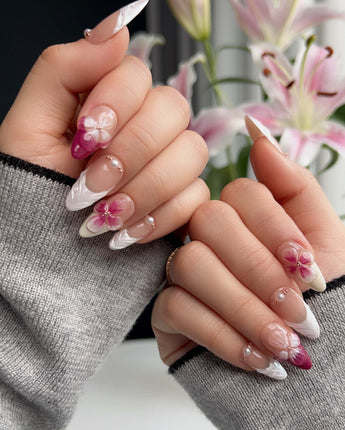 Duchess Purple close-up of sculpted purple flowers and glossy feminine nail art