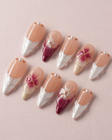 Duchess Purple stiletto nails with purple 3D flowers and polished special-occasion shine