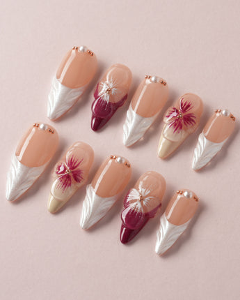 Duchess Purple stiletto nails with purple 3D flowers and polished special-occasion shine