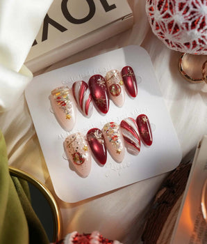 Ruby Night handmade press-on nails featuring Glitzy Red & Gold Christmas, 3D Cat-eye Swirls & Glitter Christmas Trees.