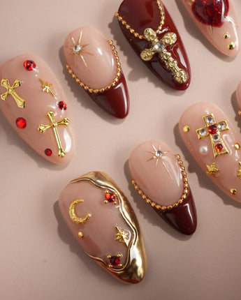 Gothic Red handmade press-on nails featuring Ornate Gothic Style, 3D Metallic Crosses & Burgundy Red.
