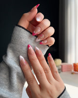 Spring Red Flower Nails nail art close-up showing pink floral french tip nails details