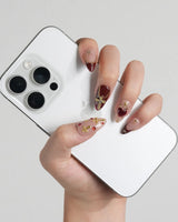Gothic Red press-on nails with deep red gothic accents, metallic crosses and glossy gel finish