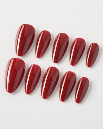 Solid Nails - Red Roses nail close-up with bold red gel color and glossy shine