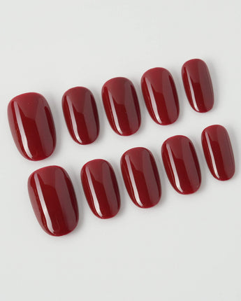 Solid Nails - Red Roses in short oval shape with deep rose red polish and glossy finish