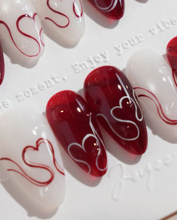 Red String nails in short almond — Deep Wine Red &