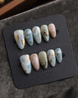 Renaissance Fresco M press-on nails in short almond with marbled pastel fresco artwork