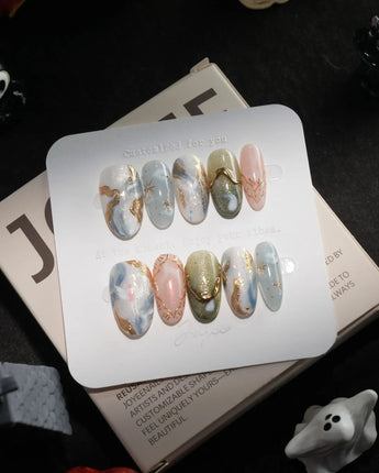 Renaissance Fresco handmade press-on nails in medium oval shape by Joyee Nails