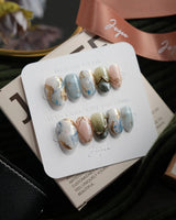 Renaissance Fresco short oval press-on nails