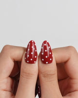 Retro Dot red polka dot nails with retro shine and balanced nude accents
