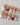 Reusable orange press-on nails with a modern French twist