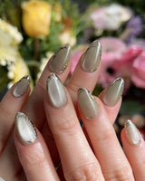 Ripples - Twinkle Reservoir nail art close-up showing Premium Silver-Grey Cat Eye, French Metal Outlines. details