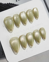 Ripples - Twinkle Reservoir press-on nails in short stiletto shape — Premium Silver-Grey Cat Eye, French Metal Outlines.