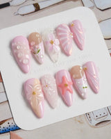 Romantic Garden press-on nails in medium stiletto shape — Delicate Pink Tone, 3D Flowers & Star.