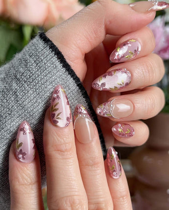 Falling Sakura nail art close-up showing Elegant Rosy Mauve, Hand-painted Blooms & Pearls. details