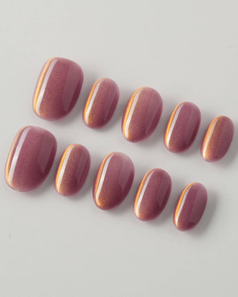Rose Brew press-on nails in extra short oval shape — Maroon cat eye nails
