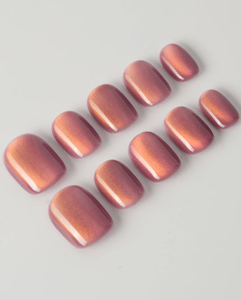 Rose Brew press-on nails in extra short squoval shape — Maroon cat eye nails