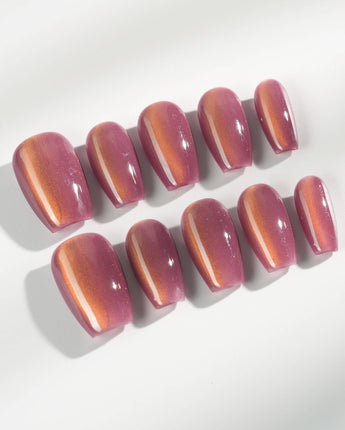Rose Brew press-on nails in short coffin shape — Maroon cat eye nails