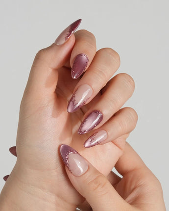 Rose Edge press-on nails with glossy rose chrome French tips and nude 3D swirl accents