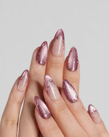 Rose Edge press-on nails with rose chrome tips, nude base and sculpted baroque swirl details
