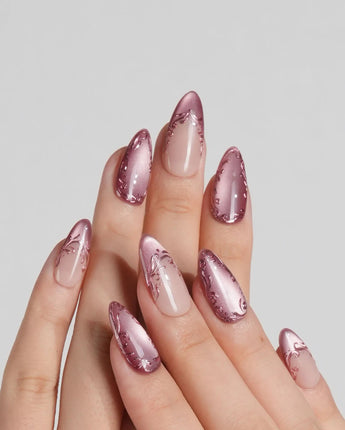 Rose Edge press-on nails with rose chrome tips, nude base and sculpted baroque swirl details