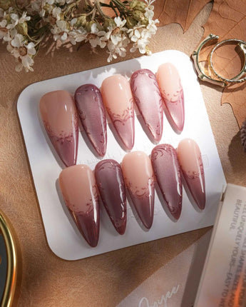 Rose Edge press-on nails with nude base, chrome rose French tips and 3D swirl linework