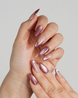Rose Edge press-on nails with rose chrome tips, baroque swirls and soft nude base