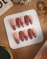 Rose Edge press-on nails with rose chrome shimmer and sculpted baroque swirl accents