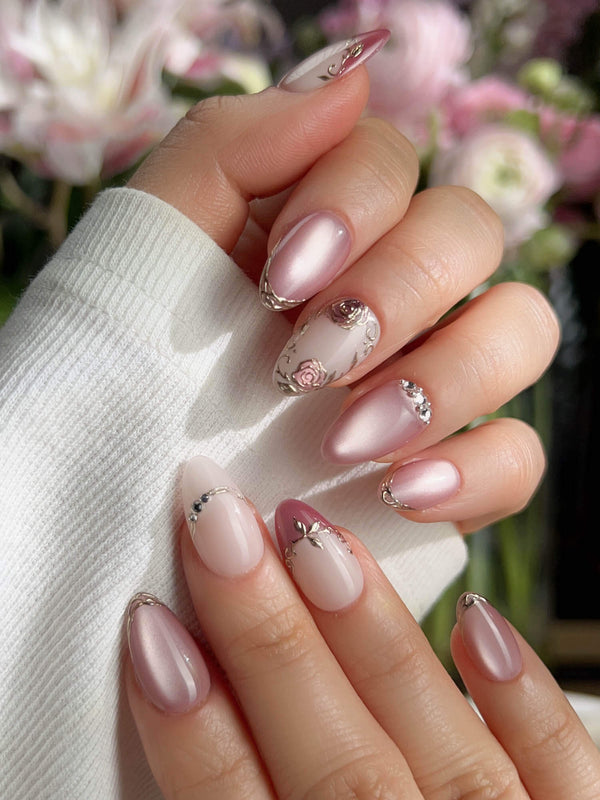 Sculpted metallic rose press-on nails with cat eye gloss