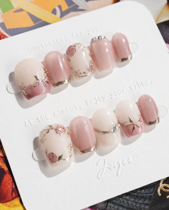 Rose-Théâtre Noir press-on nails in extra short coffin shape — Elegant Rose Pink, Embossed Florals & Metallic Edging.