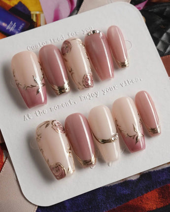 Rose-Théâtre Noir press-on nails in medium coffin shape — Elegant Rose Pink, Embossed Florals & Metallic Edging.