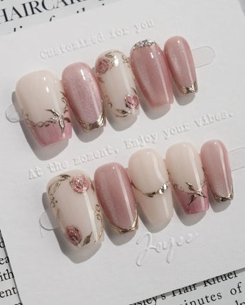 Rose-Théâtre Noir press-on nails in short coffin shape — Elegant Rose Pink, Embossed Florals & Metallic Edging.