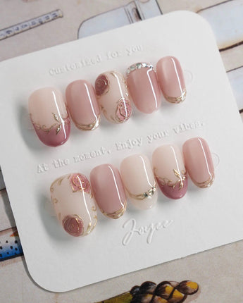 Rose-Théâtre Noir press-on nails in short oval shape — Elegant Rose Pink, Embossed Florals & Metallic Edging.