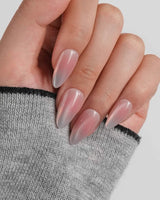 Rosy Glow magnetic gel nail art with liquid-light line through rose pink base