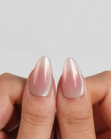 Rosy Glow short almond nails with warm nude-to-rose gradient and pink aurora cat-eye shimmer