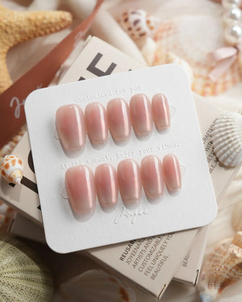 Rosy Glow pink aurora cat-eye press-on nails in short coffin shape