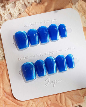 Royal Blue press-on nails in extra short coffin shape — Deep Starry Blue, Cat Eye Glossy Effect.