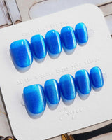 Royal Blue press-on nails in extra short oval shape — Deep Starry Blue, Cat Eye Glossy Effect.