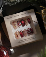 Ruby Night press-on nails in short coffin shape — Glitzy Red & Gold Christmas, 3D Cat-eye Swirls & Glitter Christmas Trees.