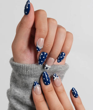 Sailor Dot nautical nail set with deep navy dots, pearl chain and white bow
