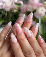 Sakura-Cipher nail art close-up showing Sweet Cherry Blossom Pink, Hand-painted Bunnies & Metallic Butterfly Wings. details