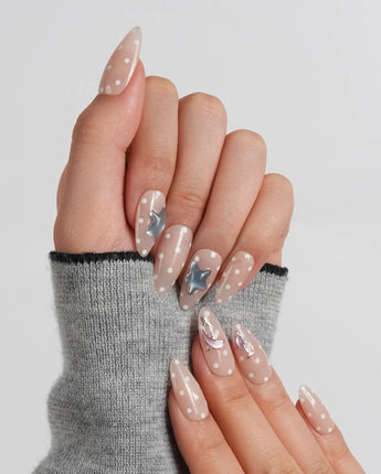 Salt & Sand coastal nail set with chrome starfish, dolphin accent, and polka dots