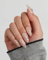 Salt & Sand beach nails with blue starfish, pink dolphin, and sea-foam dots